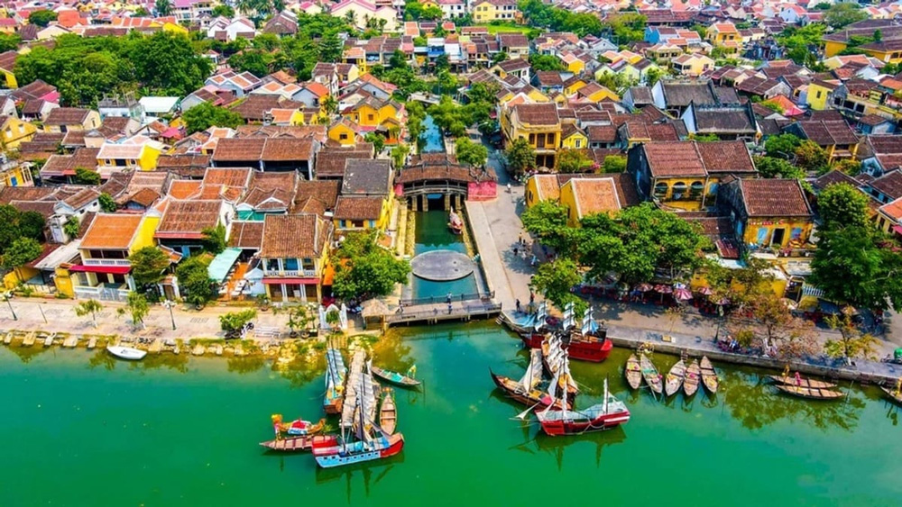What makes summer travel in Hoi An special?